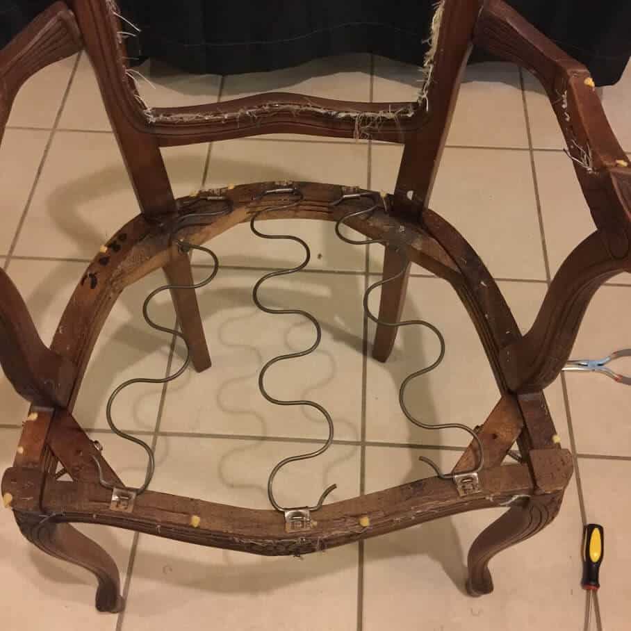 victorian armchair frame with springs exposed