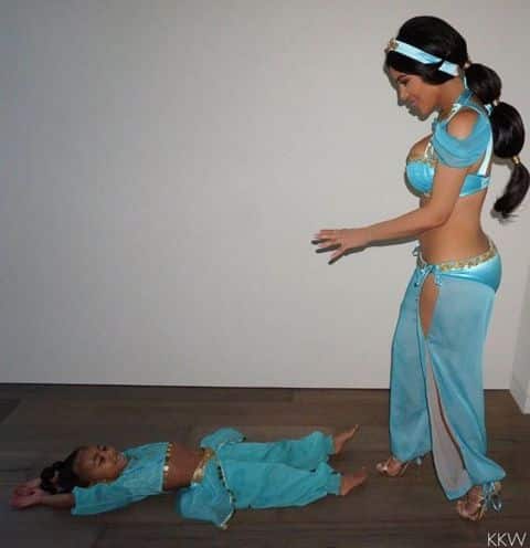 Kim Kardashian and North West playing together and dressed as princess Jazmin
