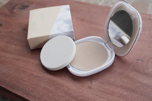 compact powder with mirror and sponge