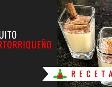 Coquito puertorriqueño in shot glasses decorated with cinnamon sticks