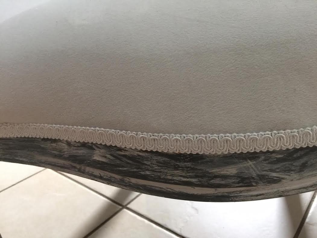 white upholstery trim perfectly glued as a termination