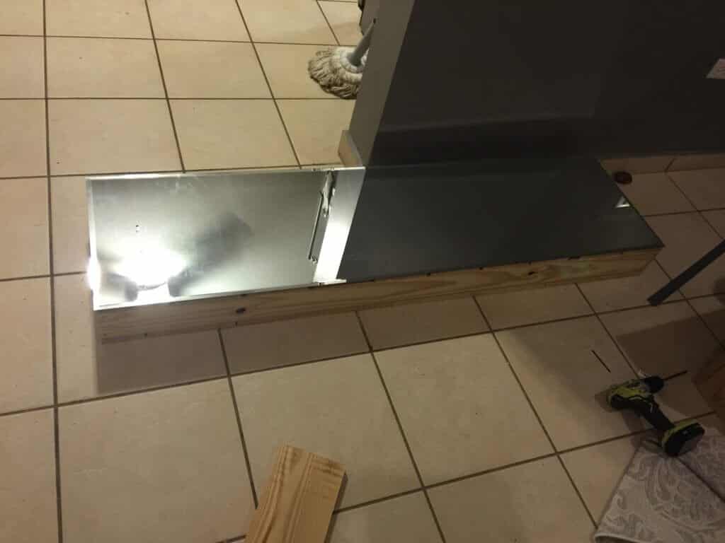 top of a diy entryway table covered in mirrors